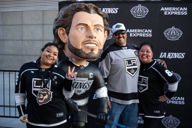 Kings fans, from left, Melissa Gamez, Boris Gamez and Monica...