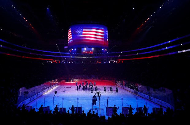 Bruce Dickinson of Iron Maiden sings the national anthem before...