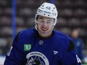 Vancouver Canucks captain Quinn Hughes during opening day of training camp in Penticton on Sept. 18. He credits a better vibe and systems for season optimism.