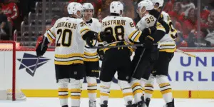 Boston Bruins celebrating a goal against the Washington Capitals on October 8, 2025.
