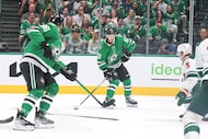 Dallas Stars center Wyatt Johnston looks to shoot during the first period of an NHL game...