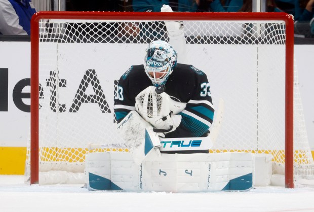 San Jose Sharks goaltender Alex Nedeljkovic (33) makes a save...