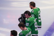 Dallas Stars center Matt Duchene (95) with his teammates take part during the National...