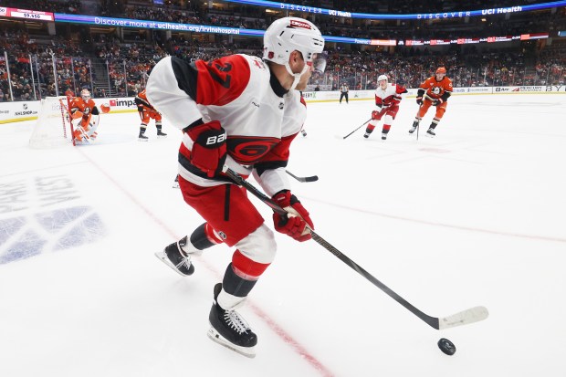Carolina Hurricanes left wing Nikolaj Ehlers controls the puck during...