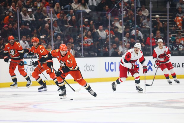 Ducks defenseman Olen Zellweger (51) controls the puck against Carolina...
