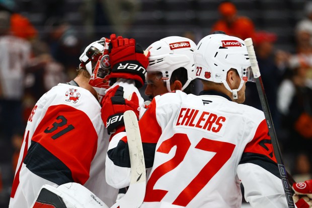Carolina Hurricanes goaltender Frederik Andersen (31), center Seth Jarvis (24),...