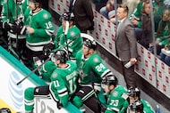 Dallas Stars head coach Glen Gulutzan watches his team change lines during the first period...