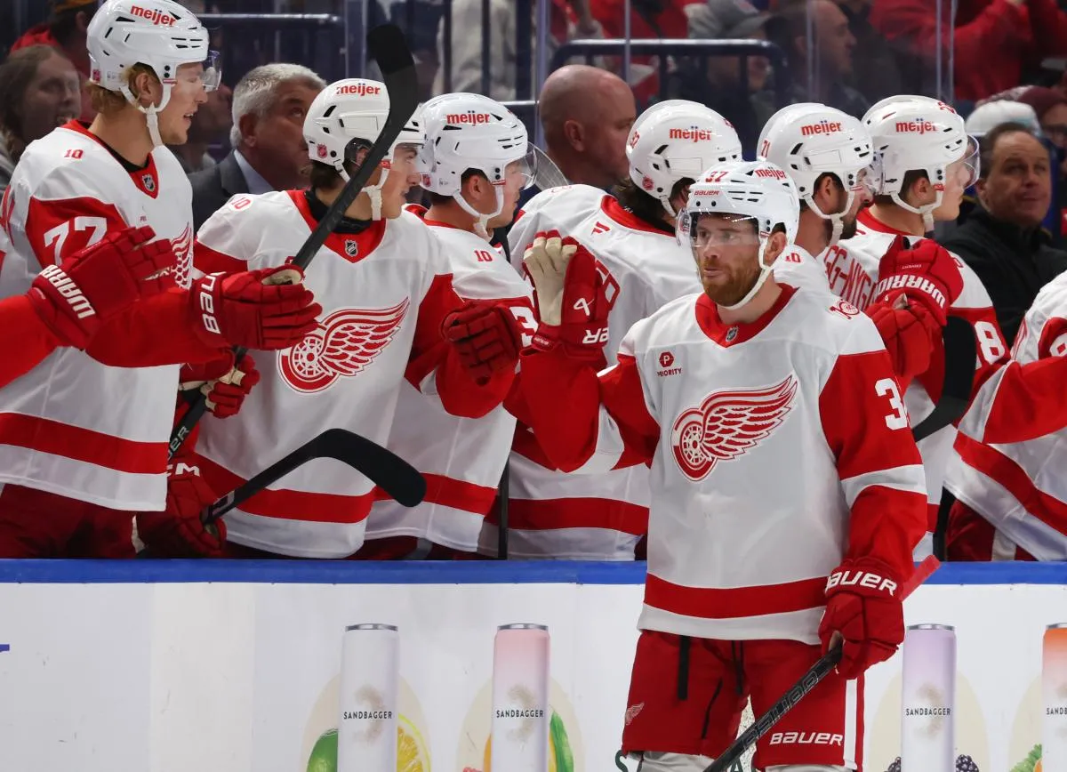 Red Wings' JT Compher appears to point fingers at two specific teammates for spoiling their win stre
