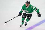 Dallas Stars center Roope Hintz skates against the Minnesota Wild during the third period of...
