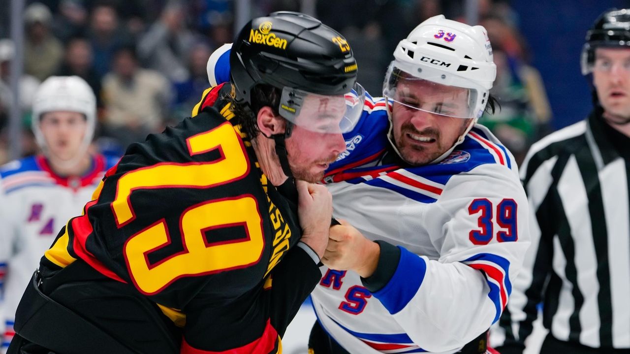 Rangers hold on late for shutout of Canucks