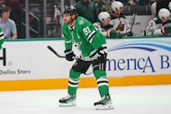 Dallas Stars center Tyler Seguin looks on during the first period of an NHL hockey game...