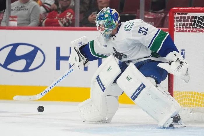  Vancouver Canucks goaltender Kevin Lankinen makes a save against the Chicago Blackhawks during the second period of an NHL hockey game Friday.