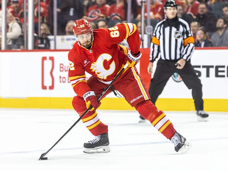  Calgary Flames defenceman Daniil Miromanov lines up a shot on the Columbus Blue Jackets in the third period at the Scotiabank Saddledome on Tuesday, Dec. 3, 2024.