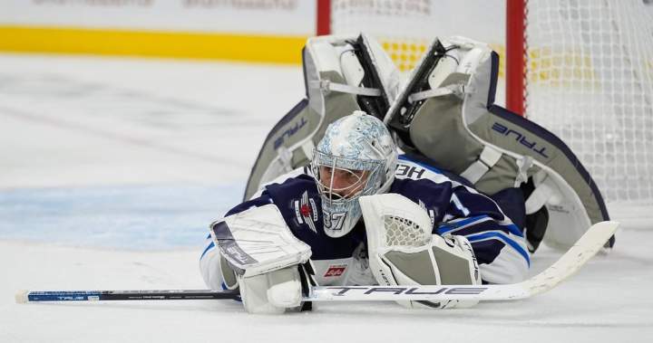 Jets rally to beat Flames 5-4 in shootout