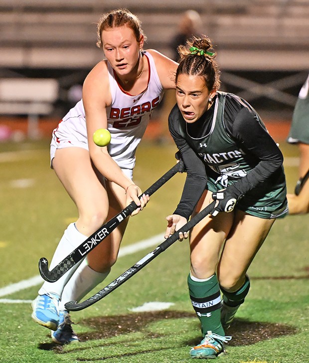 Emily Ulrich (left) and Lea DeWan fight for control of the ball in a tightly-contested PAC championship game that Methacton ultimately prevailed, 1-0 over Boyertown. (Photo by Joe Evans/JoeEvansPictures.com)