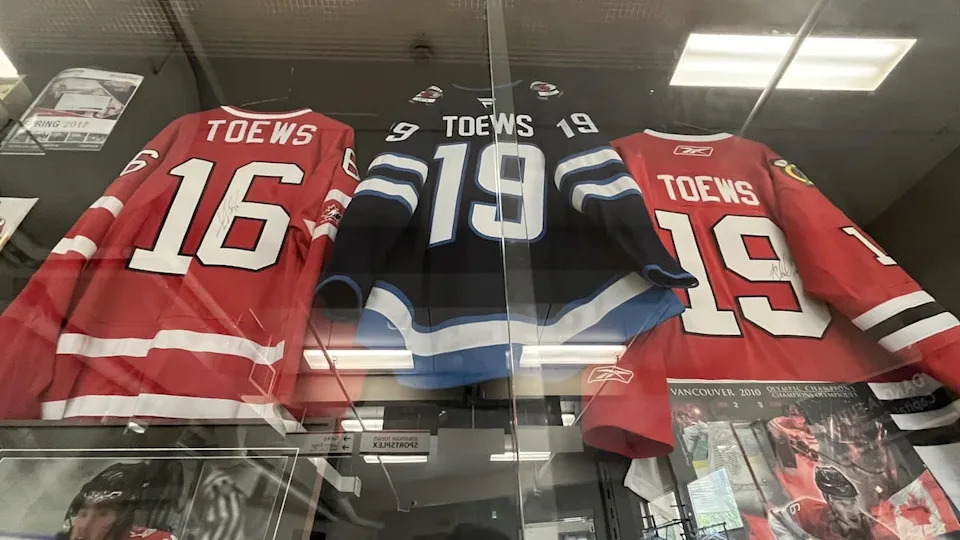 A Sept. 20, 2025, photo shows a display case at Dakota Community Centre in Winnipeg with Jonathan Toews-related memorabilia.