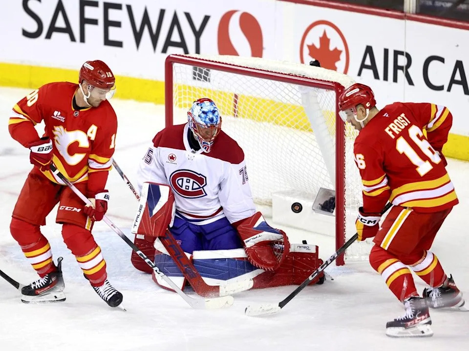  Calgary Flames Jonathan Huberdeau is stopped by Montréal Canadiens goalie Jakub Dobes in second period NHL action at the Scotiabank Saddledome in Calgary on Wednesday, October 22, 2025. Darren Makowichuk/Postmedia