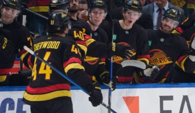 Chytil nets 2 as Vancouver Canucks thump Flames 5-1 to open NHL season