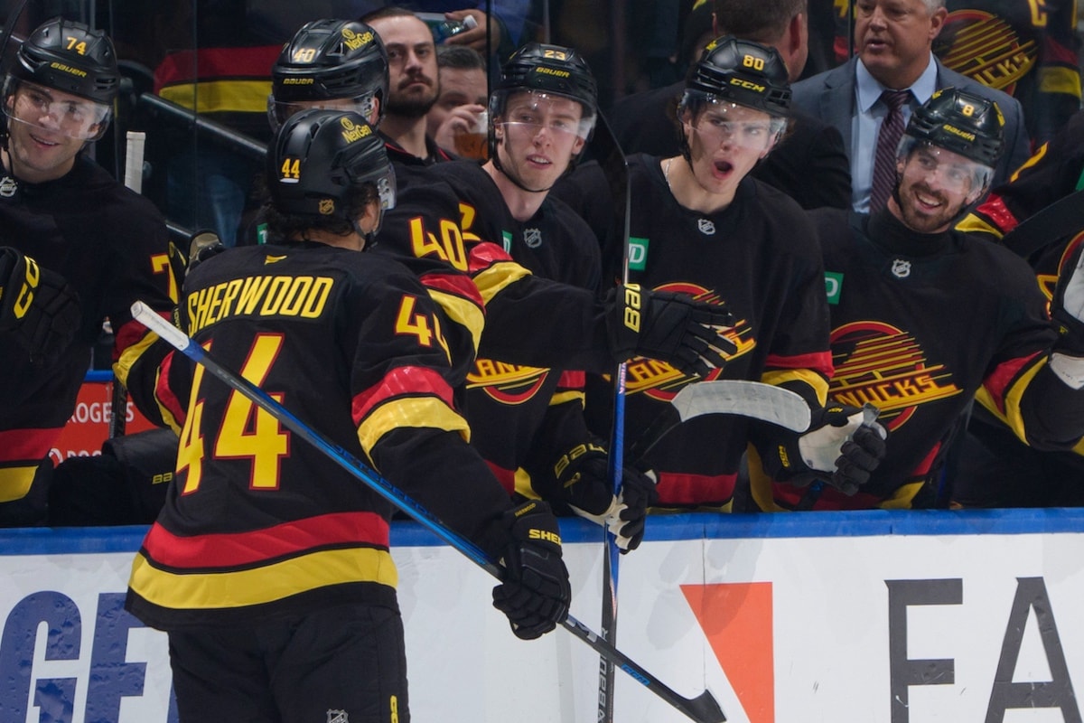 Chytil nets 2 as Vancouver Canucks thump Flames 5-1 to open NHL season