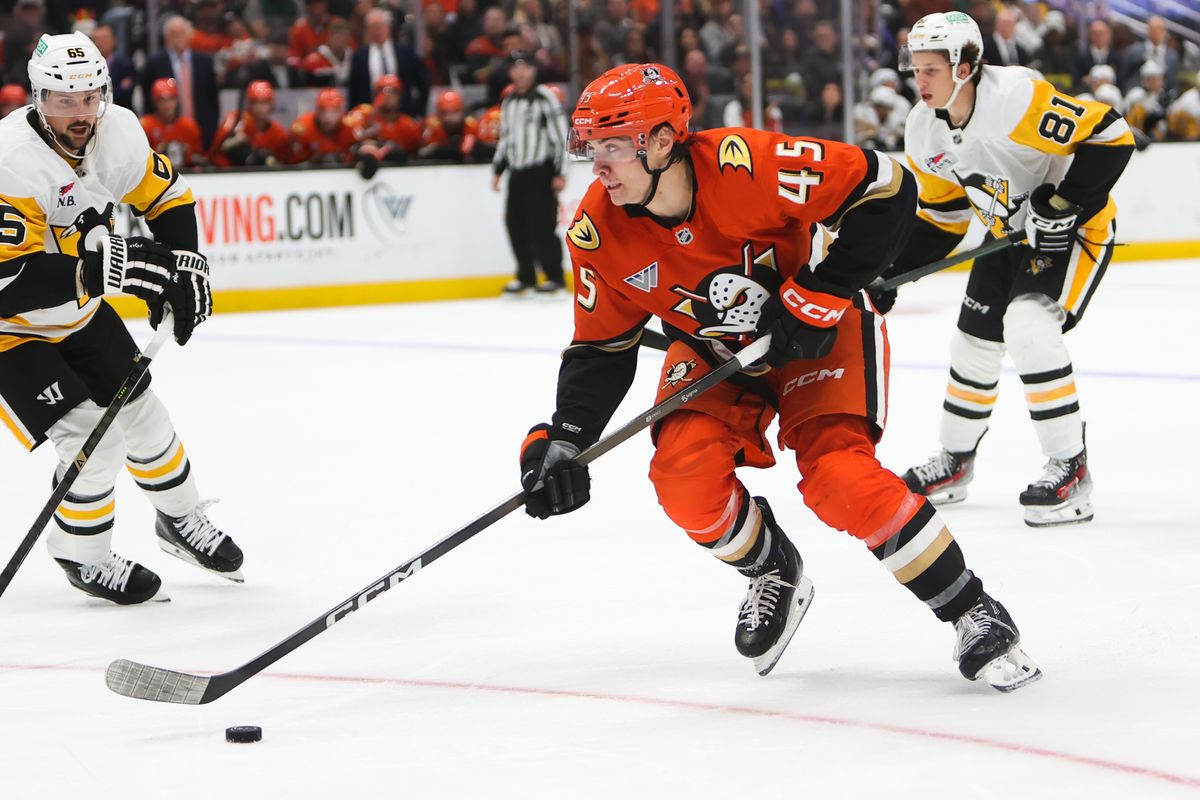 #45 RW Beckett Sennecke of the Anaheim Ducks skates with the puck during an NHL game against the Pittsburg Penguins on October 14, 2025 in Anaheim, CA.