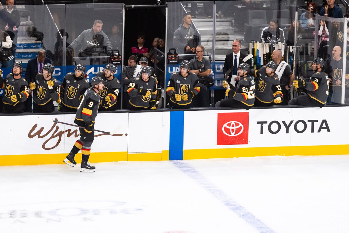 Vegas Golden Knights center Jack Eichel (9) fist bumps teammates on the bench after scoring a goal during a NHL game between the Vegas Golden Knights and the Carolina Hurricanes, Monday October 20, 2025 in Las Vegas, Nev.