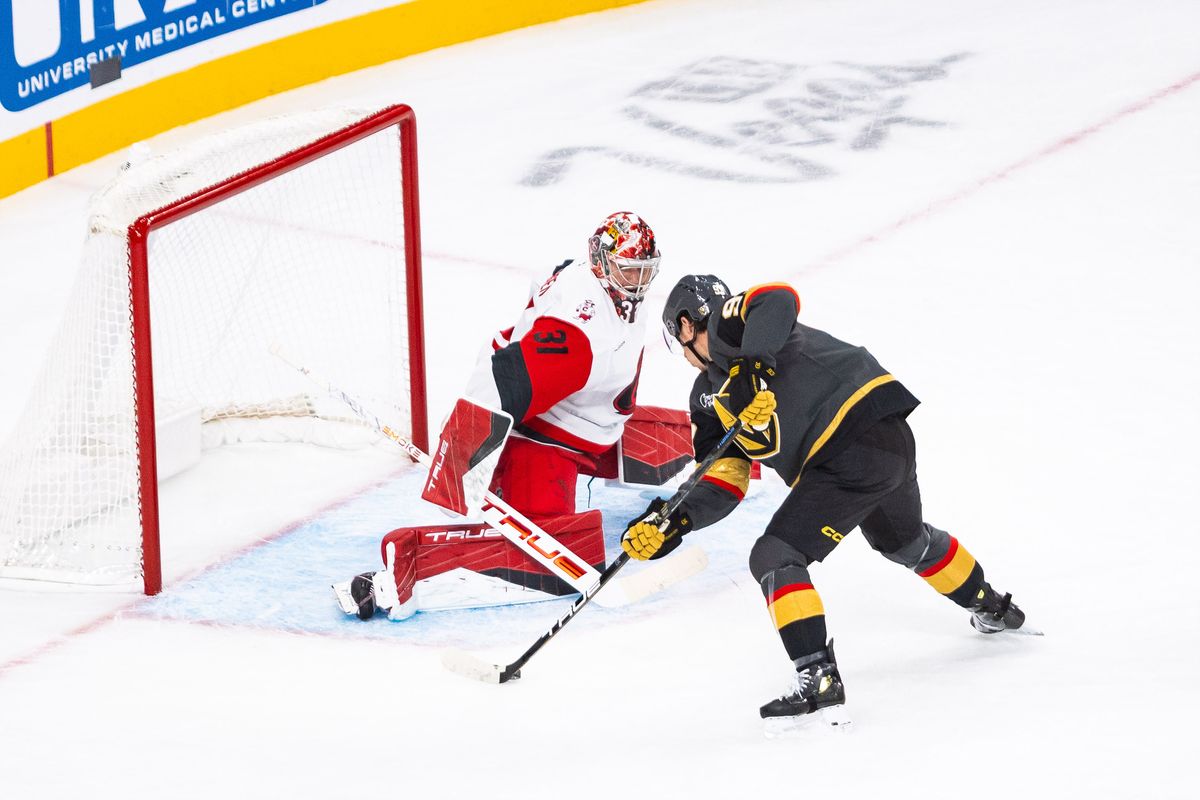 Carolina Hurricanes goaltender Frederik Andersen (31) stretches to make a save on Vegas Golden Knights right-wing Mitch Marner (93) during a NHL game between the Vegas Golden Knights and the Carolina Hurricanes, Monday October 20, 2025 in Las Vegas, Nev.