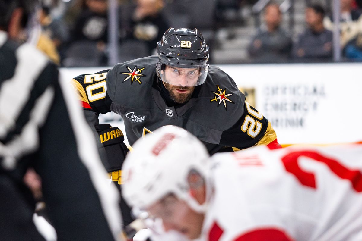 Vegas Golden Knights left-wing Brandon Saad (20) stares at the puck during a face-off during a NHL game between the Vegas Golden Knights and the Carolina Hurricanes, Monday October 20, 2025 in Las Vegas, Nev.