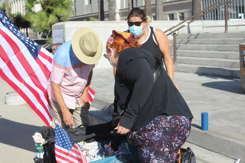 women giving out waters.