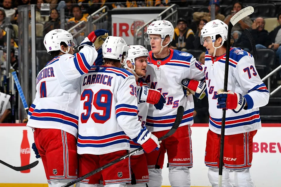 Adam Fox #23 of the New York Rangers celebrates his second period goal against the Pittsburgh Penguins at PPG PAINTS Arena on October 11, 2025 in Pittsburgh, Pennsylvania. NHLI via Getty Images