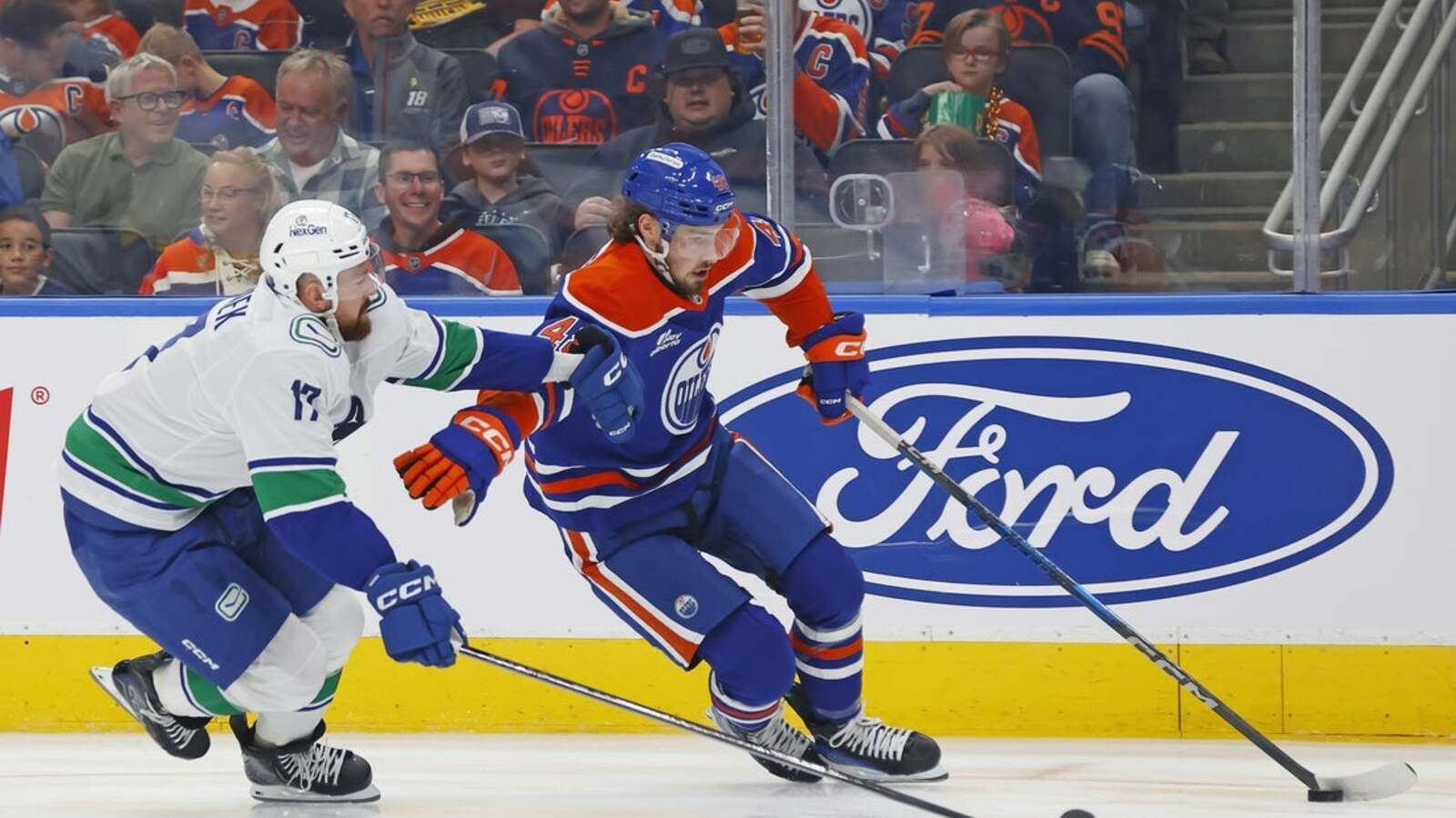 Oilers find scoring touch, hold off Canucks