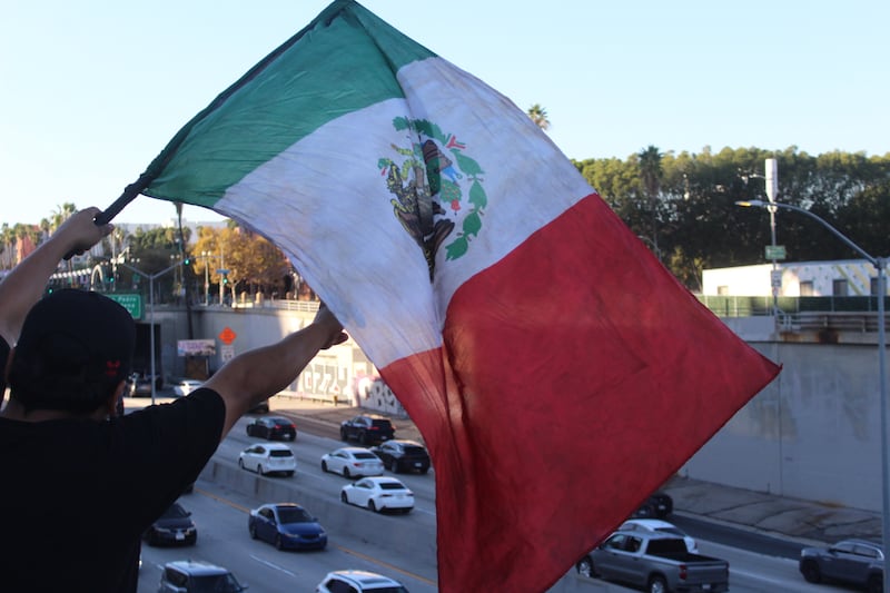 Mexican flag over 101 freeway.