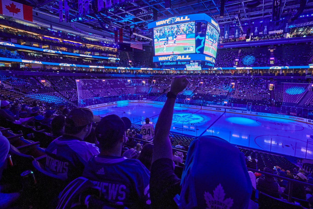 Following Maple Leafs’ loss, fans stick around to watch Jays game at Scotiabank Arena