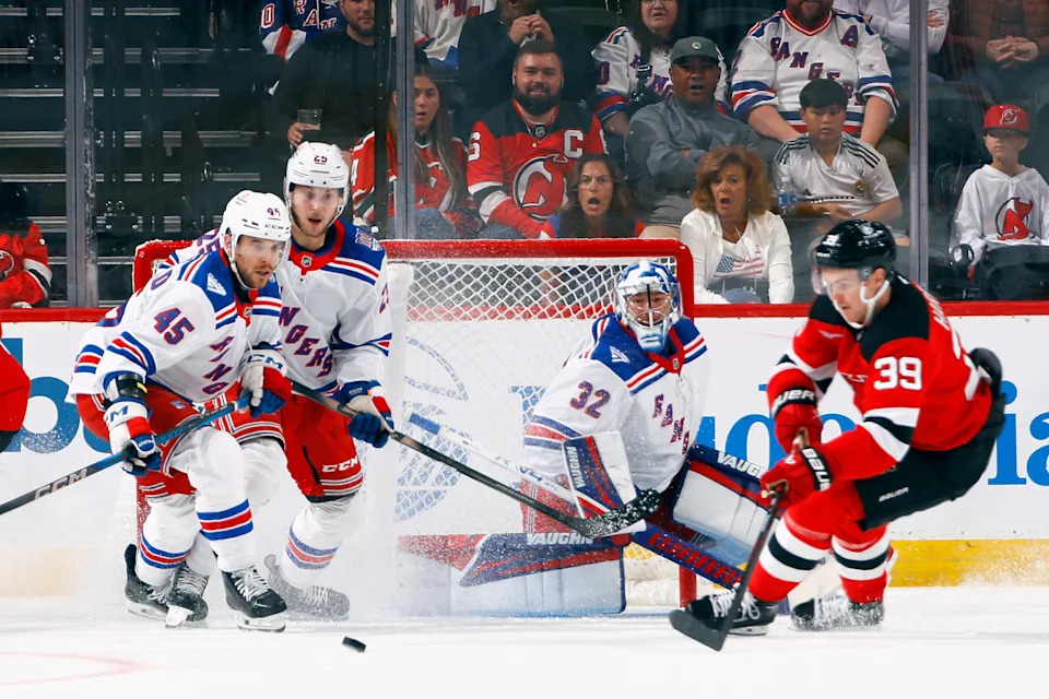 NEWARK, NEW JERSEY - SEPTEMBER 21: The New York Rangers defend against Mike Hardman #39 and the New Jersey Devils in a preseason game at the Prudential Center on September 21, 2025 in Newark, New Jersey. (Photo by Bruce Bennett/Getty Images)