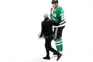 Dallas Stars center Roope Hintz (24) skates off the ice and to the locker room after being...