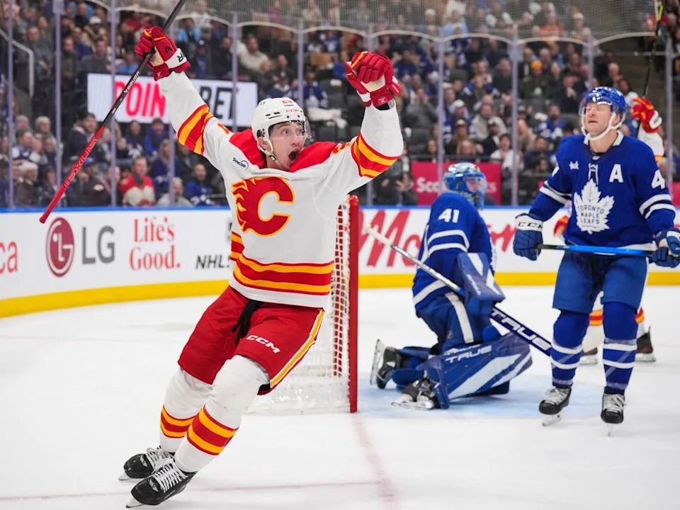  Flames forward Sam Honzek celebrates his first NHL goal on Tuesday.