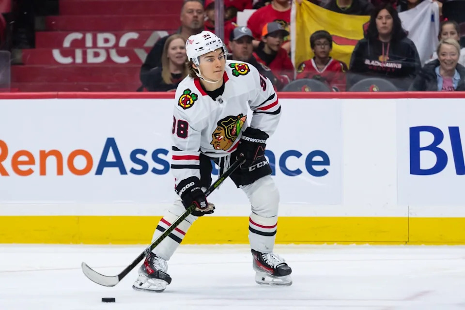 Apr 15, 2025; Ottawa, Ontario, CAN; Chicago Blackhawks center Connor Bedard (98) controls the puck in the second period against the Ottawa Senators at the Canadian Tire Centre. Mandatory Credit: Marc DesRosiers-Imagn ImagesMarc DesRosiers-Imagn Images&NewLine;