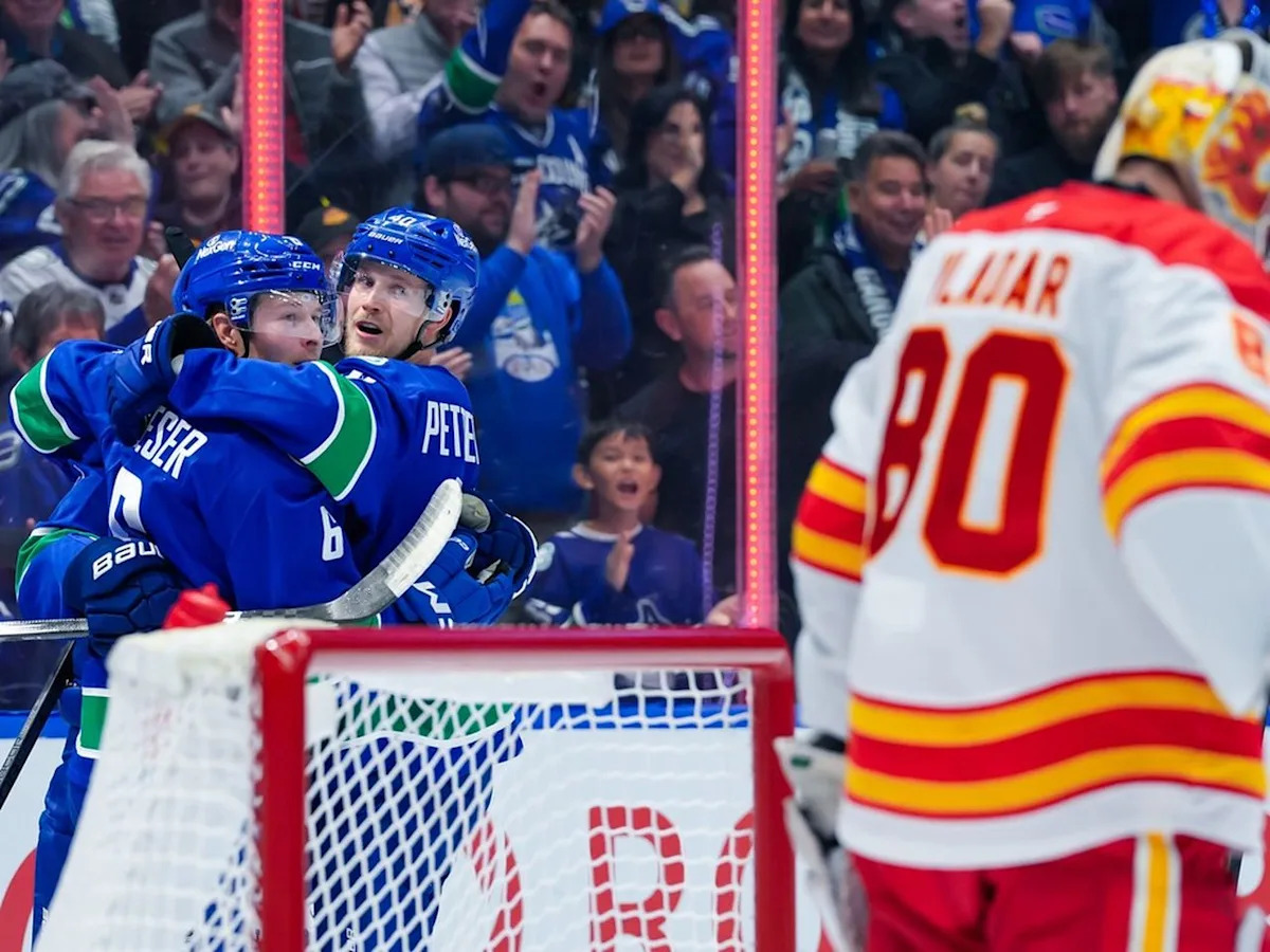 Canucks vs. Flames, drop the puck!