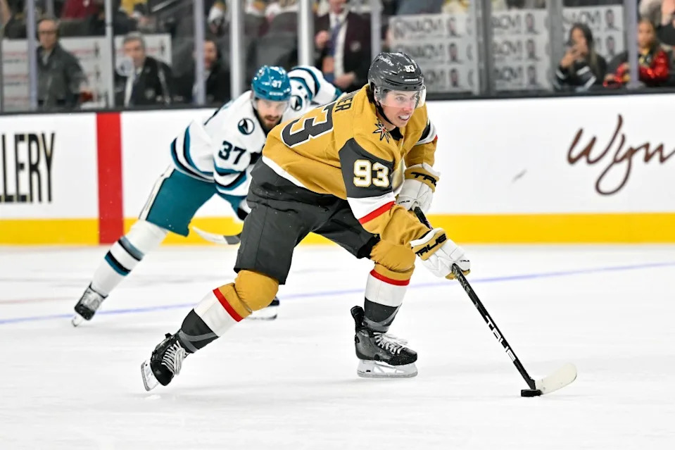 Mitch Marner #93 of the Vegas Golden Knights skates up ice against Timothy Liljegren #37 of the San Jose Sharks. NHLI via Getty Images