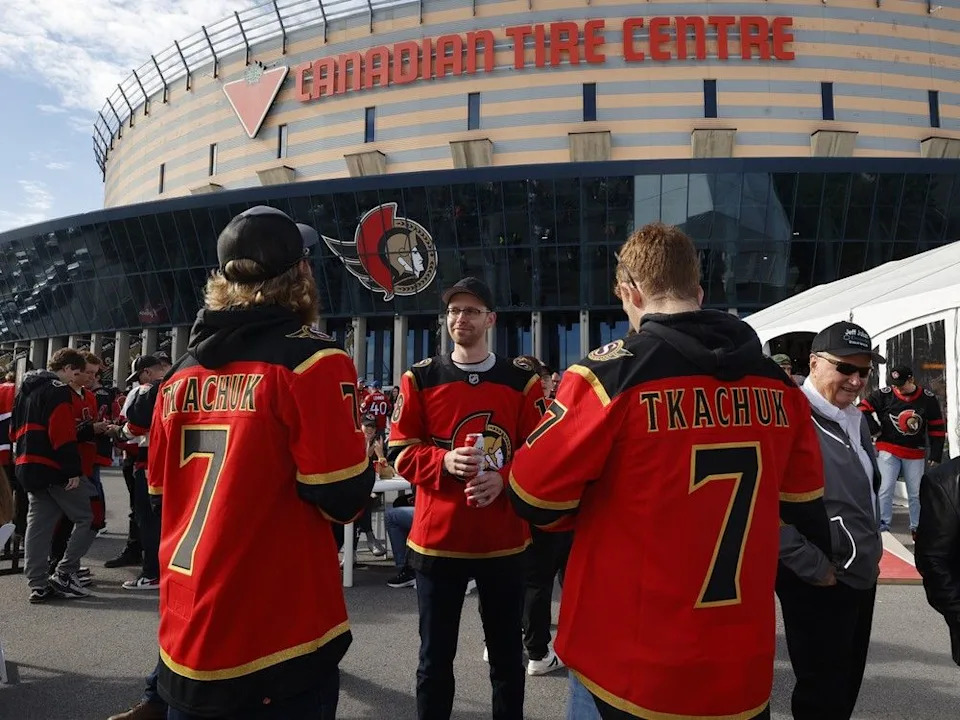  Sens fans enjoying the nice weather outside the Canadian Tire Centre before the Ottawa Senators’ home opener Monday.