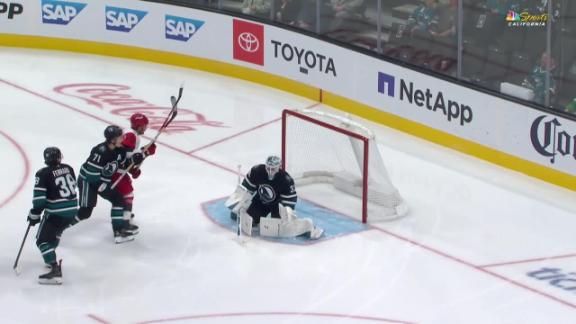 Carrier, Robinson score late in 2nd period and Hurricanes beat Sharks 5-1 to improve to 3-0