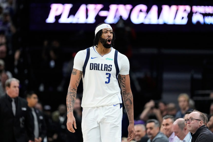 Dallas Mavericks forward Anthony Davis (3) reacts during the first half of an NBA play-in...