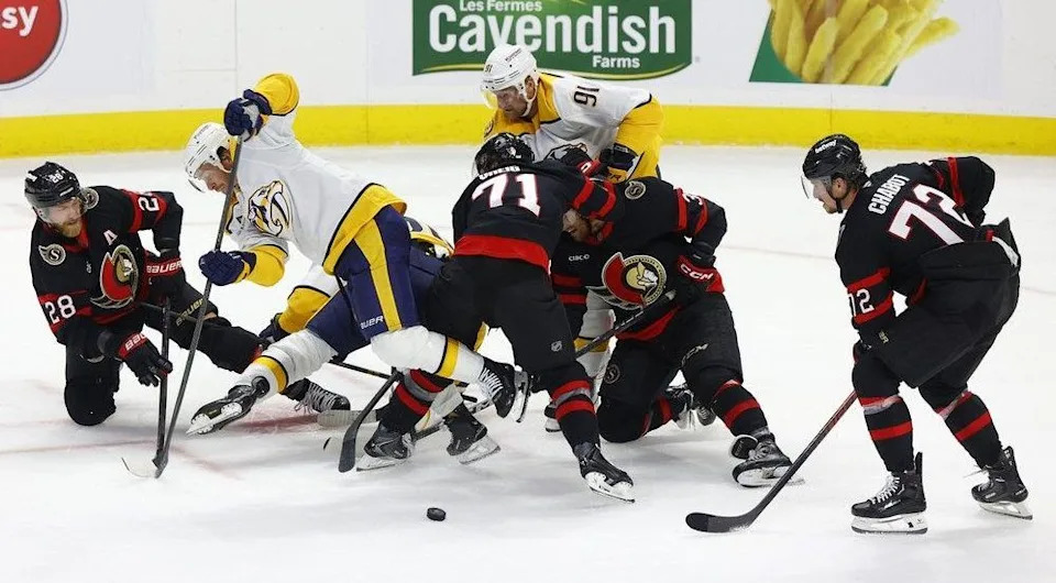  An Ottawa Senators traffic jam with the Nashville Predators during first-period action at the Canadian Tire Centre in Ottawa Monday.