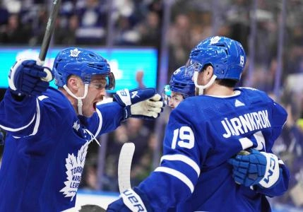 Nov 11, 2023; Toronto, Ontario, CAN; Toronto Maple Leafs left wing Nicholas Robertson (89) scores a goal against the Vancouver Canucks and celebrates with center Calle Jarnkrok (19) and center Max Domi (11) during the third period at Scotiabank Arena. Mandatory Credit: Nick Turchiaro-USA TODAY Sports Nov 11, 2023; Toronto, Ontario, CAN; Toronto Maple Leafs left wing Nicholas Robertson (89) scores a goal against the Vancouver Canucks and celebrates with center Calle Jarnkrok (19) and center Max Domi (11) during the third period at Scotiabank Arena. Mandatory Credit: Nick Turchiaro-USA TODAY Sports