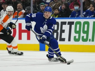 Toronto Maple Leafs forward Nick Abruzzese carrying the puck against the Philadelphia Flyers. Toronto Maple Leafs forward Nick Abruzzese carrying the puck against the Philadelphia Flyers.