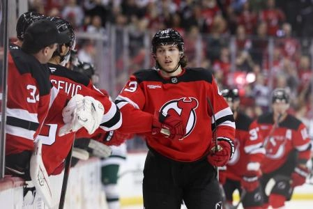 New Jersey Devils defenseman Luke Hughes (43) celebrates his goal against the Minnesota Wild during the first period at Prudential Center. New Jersey Devils defenseman Luke Hughes (43) celebrates his goal against the Minnesota Wild during the first period at Prudential Center.