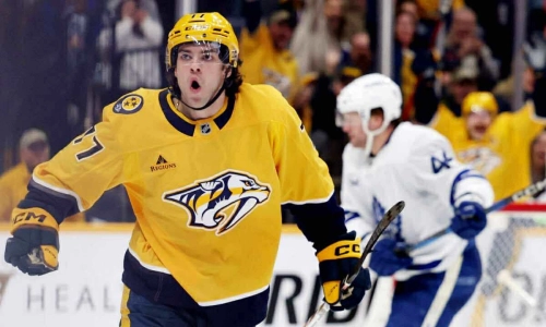 Mar 22, 2025; Nashville, Tennessee, USA; Nashville Predators right wing Luke Evangelista (77) celebrates after scoring a goal during the third period of their game against the Toronto Maple Leafs at Bridgestone Arena. Mandatory Credit: Alan Poizner-Imagn Images Mar 22, 2025; Nashville, Tennessee, USA; Nashville Predators right wing Luke Evangelista (77) celebrates after scoring a goal during the third period of their game against the Toronto Maple Leafs at Bridgestone Arena. Mandatory Credit: Alan Poizner-Imagn Images