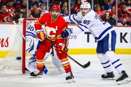 Feb 4, 2025; Calgary, Alberta, CAN; Calgary Flames center Nazem Kadri (91) and Toronto Maple Leafs defenseman Oliver Ekman-Larsson (95) fights for position in front of Toronto Maple Leafs goaltender Joseph Woll (60) during the second period at Scotiabank Saddledome. Mandatory Credit: Sergei Belski-Imagn Images Feb 4, 2025; Calgary, Alberta, CAN; Calgary Flames center Nazem Kadri (91) and Toronto Maple Leafs defenseman Oliver Ekman-Larsson (95) fights for position in front of Toronto Maple Leafs goaltender Joseph Woll (60) during the second period at Scotiabank Saddledome. Mandatory Credit: Sergei Belski-Imagn Images