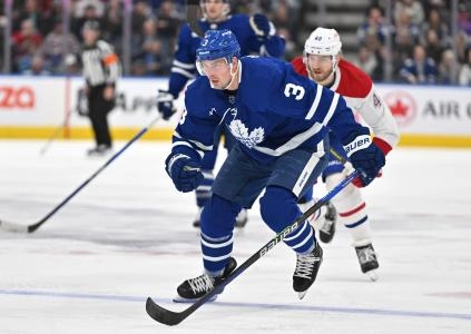 Apr 8, 2023; Toronto, Ontario, CAN; Toronto Maple Leafs defenseman Justin Holl (3) skates after the puck against the Montreal Canadians in the second period at Scotiabank Arena. Mandatory Credit: Dan Hamilton-Imagn Images