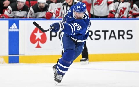 Apr 11, 2024; Toronto, Ontario, CAN; Toronto Maple Leafs defenseman Mark Giordano (55) shoots the puck against the New Jersey Devils in the first period at Scotiabank Arena