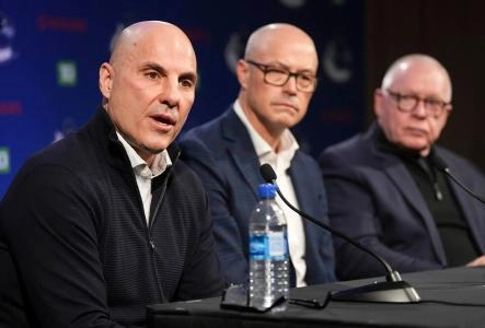 Ed head coach Rick Tocchet and Vancouver Canucks GM Patrik Allvin with Jim Rutherford